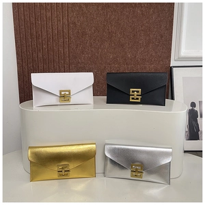 Detail showing envelope clutch bags in four colors with gold rectangular metal closures