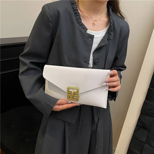 Chic white envelope clutch bag with gold interlocking buckle and saffiano texture finish