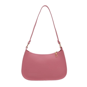 Vintage dusty rose half-moon hobo bag with gold hardware and slim leather shoulder strap