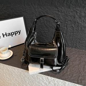 Retro black patent leather backpack with white contrast stitching and silver metal buckle