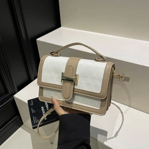 Fashionable color-block crossbody bag with embossed triangle pattern and gold clasp