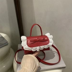 Red ballet-style crossbody bag with lace trim and bow accent for sweet lolita look