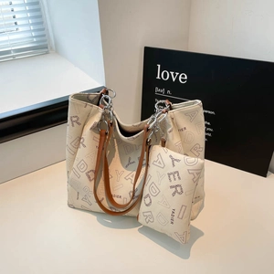 Premium cream white tote bag set with monogram print and brown leather straps