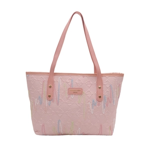 Pink quilted tote bag with colorful embroidery and gold logo on high-quality faux leather