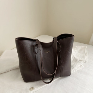 Large capacity vintage brown tote bag in premium leather finish for office and daily wear