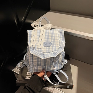 Mini blue and white plaid canvas drawstring backpack with lace bow and flap closure