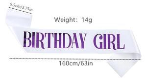 Detail of white satin sash featuring metallic purple Birthday Girl printed lettering