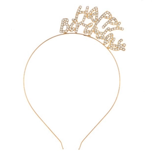 Detail of golden Happy Birthday crown headband with sparkling rhinestone lettering