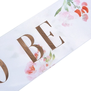 Elegant white satin Bride to Be sash with pink floral patterns and wood texture print