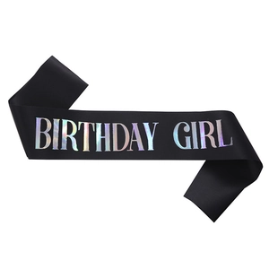 Pink and purple BIRTHDAY GIRL sash with holographic lettering on black satin fabric
