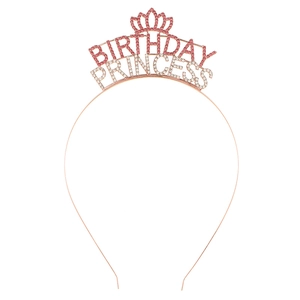 Close-up of rose gold Birthday Princess tiara headband with pink and white rhinestones