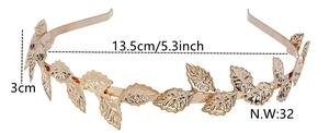 Detail view of golden laurel leaf metal headband with size measurements in 13.5cm width