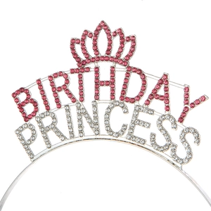 Close-up of Birthday Princess tiara with pink and silver rhinestones on white background