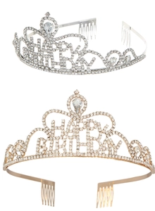 Close-up of gold and silver Happy Birthday crowns with sparkling rhinestones and hair combs