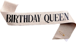 Detail of glitter champagne gold Birthday Queen sash with a secure safety pin fastener