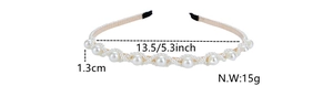 Detail view of pearl headband showing 13.5cm width and 1.3cm white bead size specs