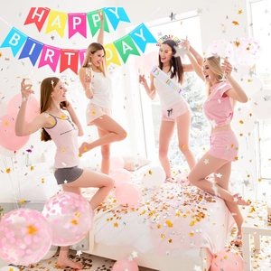 Vibrant birthday party set featuring rainbow banner, sash, and headband with festive balloons