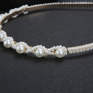 Elegant gold metal headband with woven pearls for weddings and formal hairstyles