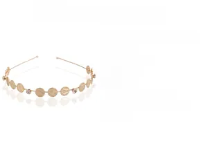 Close-up of gold leaf hair hoop with vintage coins and sparkling rhinestones