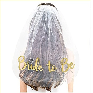 White double layer bridal veil with gold Bride to Be lettering and comb for bachelorette party
