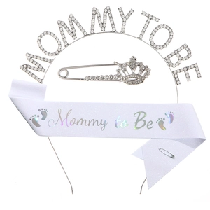 Three-piece baby shower set with rhinestone headband, sash, and pin for mommy to be
