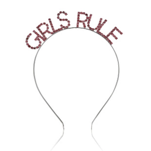 Detailed view of metal headband featuring pink rhinestone GIRLS RULE lettering