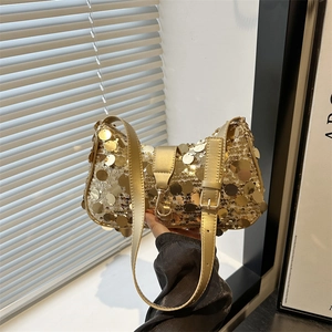 Chic gold sequin shoulder bag with adjustable leather strap and metallic buckle design