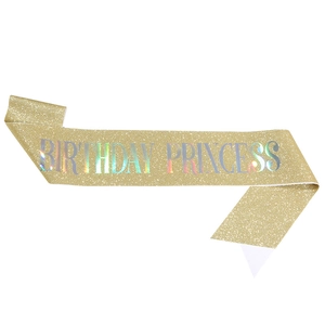 Fascia dorata glitterata Birthday Princess con scritte laser olografiche su sfondo bianco