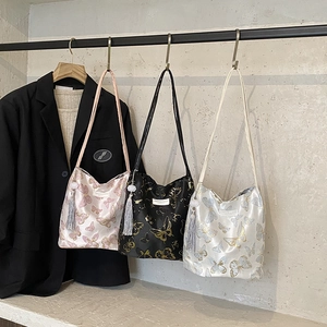 Chic embroidered butterfly tote bags in pink black and white with elegant tassels