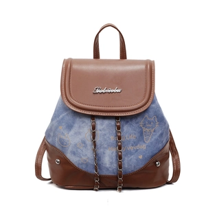 Minimalist color-block denim and leather backpack with cartoon cat print and logo