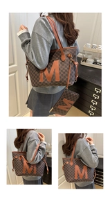 Close-up of brown tote set with M-pattern logo print and matching small pouch