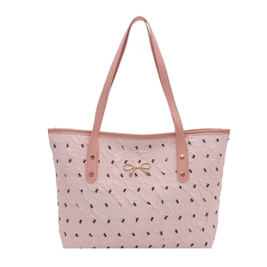 Pink pleated shoulder tote bag with black bow patterns and gold metal detail
