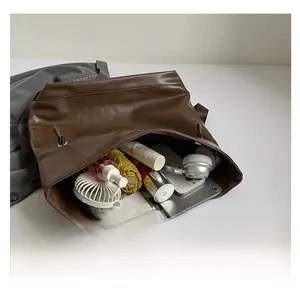 Interior view of the brown PU tote bag showcasing large capacity for daily essentials