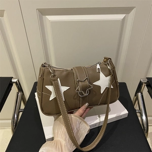 Vintage brown shoulder bag with white star pattern and star-shaped metal buckle