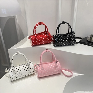 Polka dot cylinder boston handbag in red black white and pink with shiny finish