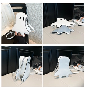 Detail view of the ghost-shaped crossbody bag featuring contrast stitching and zipper