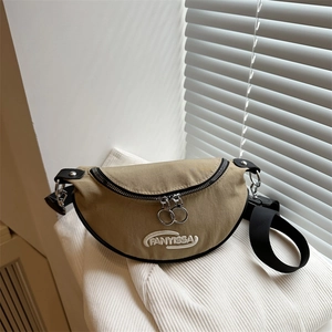 Trendy khaki embroidered chest bag with silver dual zippers and adjustable black strap