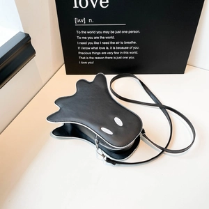 Funny ghost-shaped crossbody bag with white piping and eyes in chic black PU leather