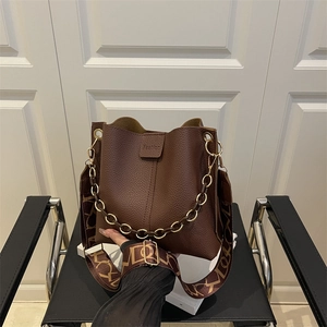 Deep brown lychee pattern bucket bag with metal chain and vintage wide strap