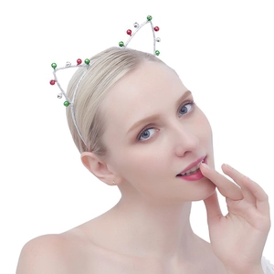 Close-up of cat-ear Christmas headband with red, green, and silver festive bells