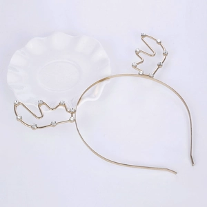Creative festive gold antler headband with white crystals for Christmas celebration