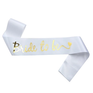 Detail of white satin Bride to Be sash with elegant gold foil lettering for parties