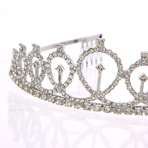 Detailed macro view of the 16th birthday silver rhinestone tiara with integrated hair comb