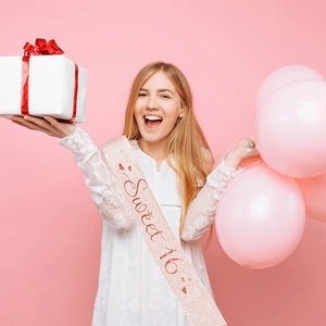Pink glitter Sweet 16 sash for girls birthday party with rose gold lettering