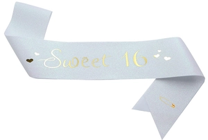 Detail of glittery Sweet 16 birthday sash in white and gold with a safety pin accessory