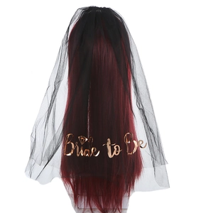 Detail of black bridal veil with rose gold Bride to Be lettering and diamond pattern