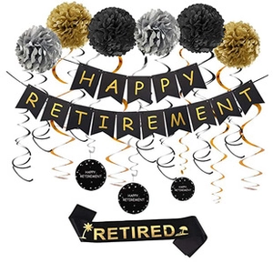 Detail of retirement party set including Happy Retirement banner and gold honeycomb balls