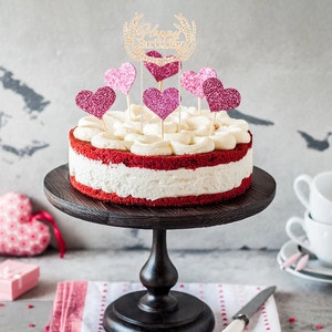 Golden antler Happy Birthday cake topper set with pink heart decor on red velvet cake