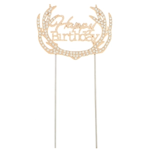 Detailed view of gold metal Happy Birthday cake topper with antlers and white rhinestones