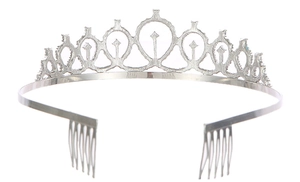 Detailed view of silver birthday tiara featuring crystal patterns and secure hair combs